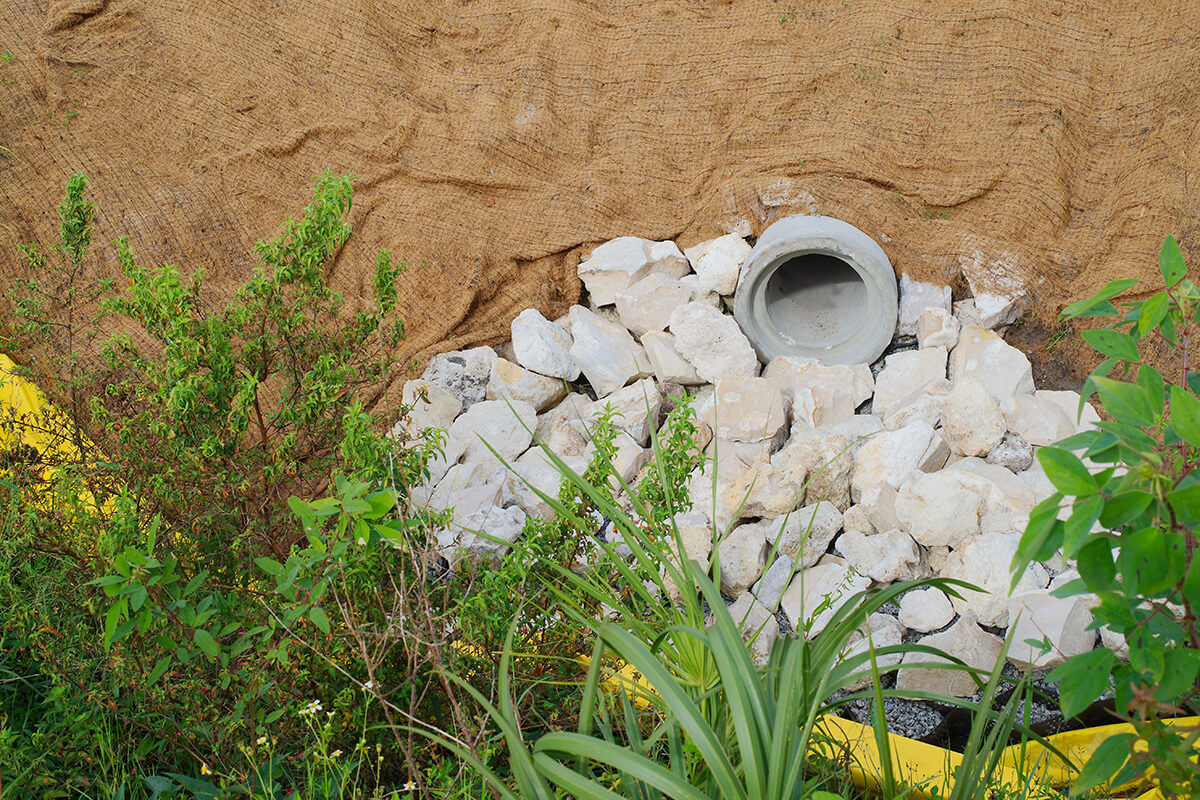 Stormwater outfall pipe with rocks